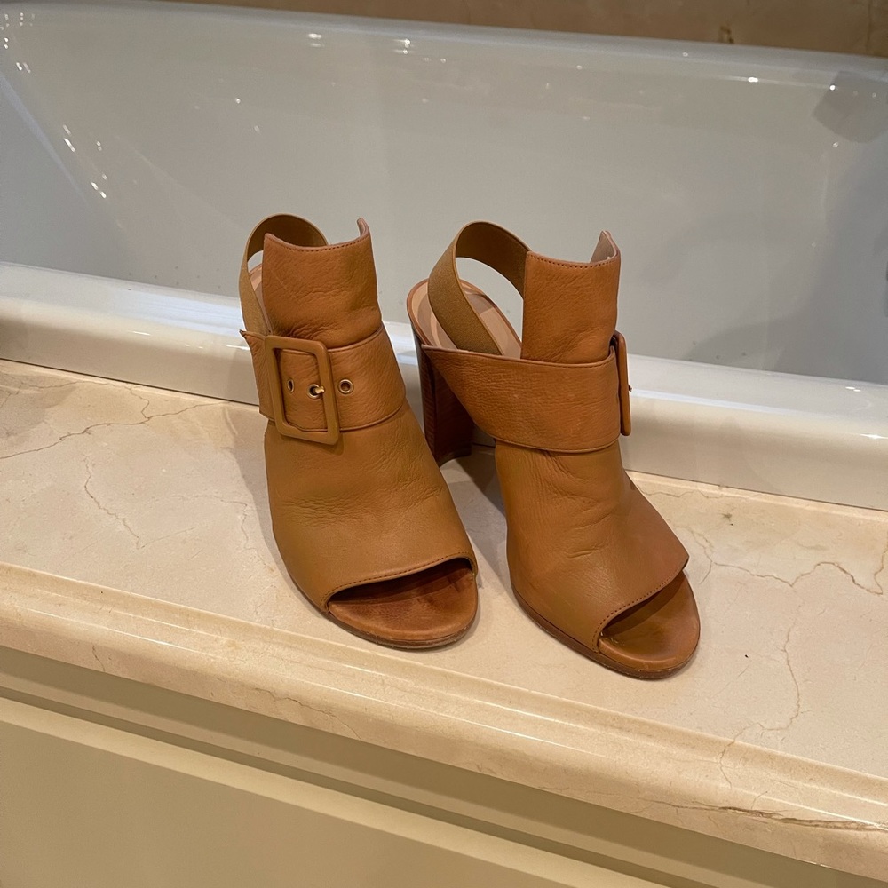 Stuart Weitzman sandals.